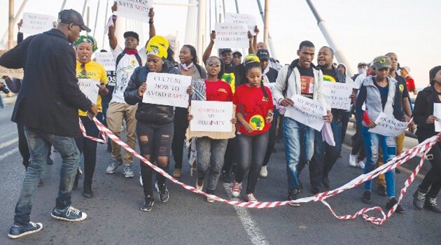 Fiercly condemning rape ... Gauteng students protest against rape by stopping rush hour traffic on Wednesday